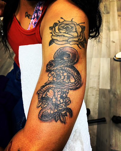 Work by Up Top tattoos