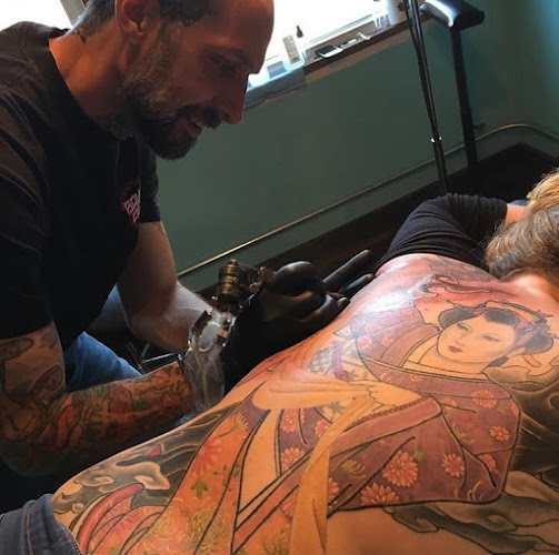 Work by Windhorse Tattoo