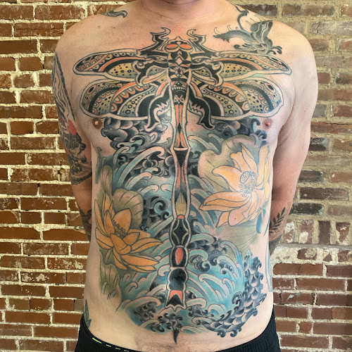 Work by Electric Unicorn tattoo studio