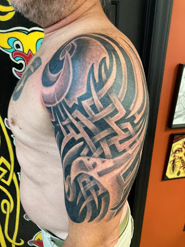 Work by Knightdale Tattoo Company
