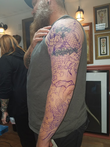 Work by American Tattoo Studio