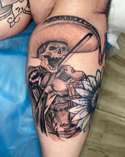 Work by Skin Surffers tattoo shop