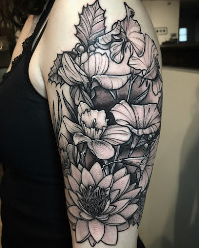 Work by Lucky 13 Tattoos and Body Piercing
