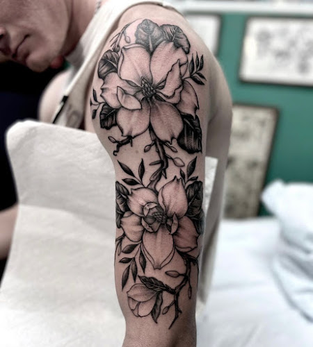 Work by Purple Rose Tattoo