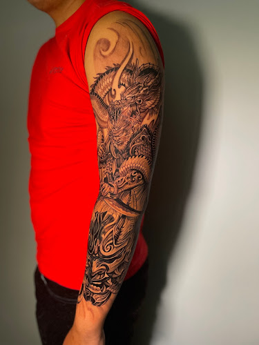 Work by Moreira Ink Tattoo Shop