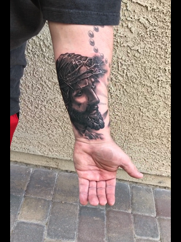 Work by Visual Design Works Tattoos