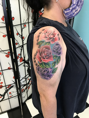 Work by Sacred heart tattoo