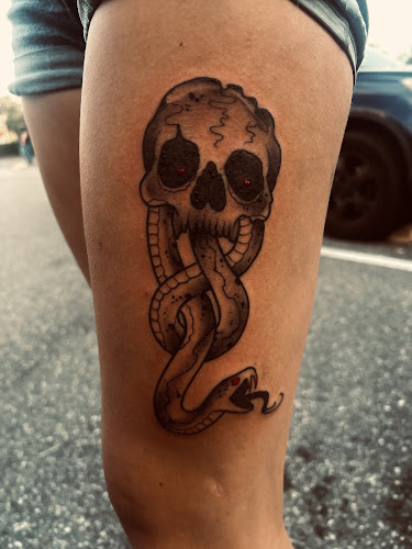 Work by Stars and Stripes Tattoos