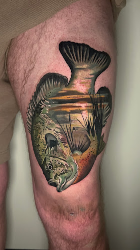 Work by SharkTooth Tattoo & Gallery