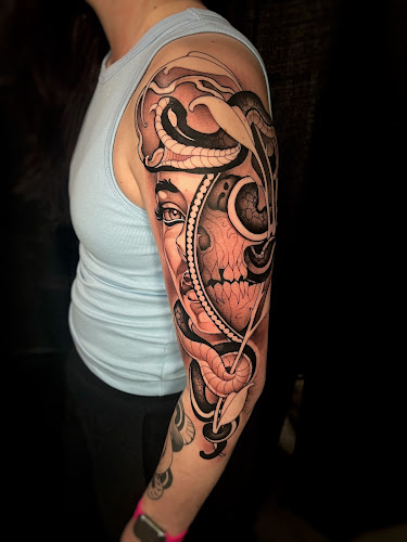 Work by Red Letter Tattoo Studio LLC