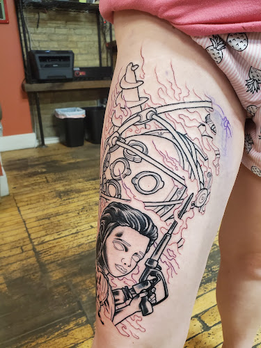 Work by Fish Ladder Tattoo Company