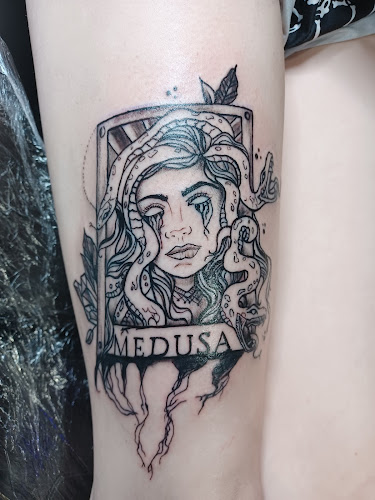 Work by Ink Therapy Lansing