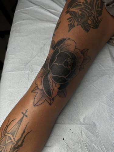 Work by Sacred Art Tattoo