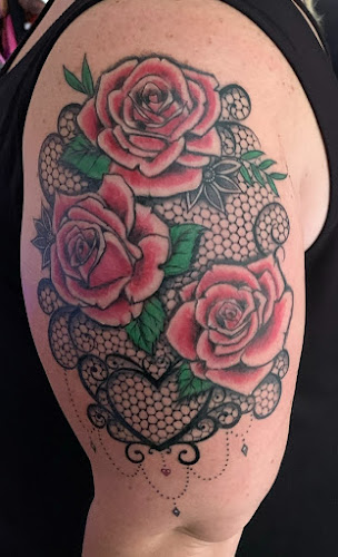 Work by Blck Teeth Tattoo