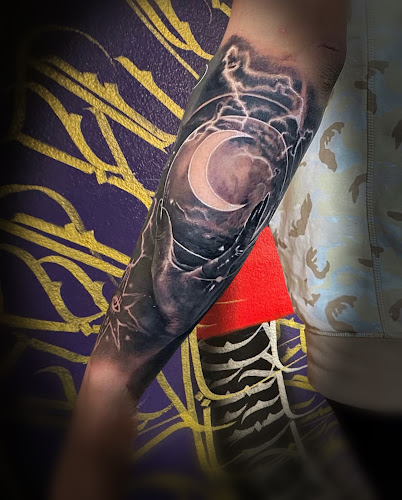 Work by Blood and Gold Tattoo Piercing