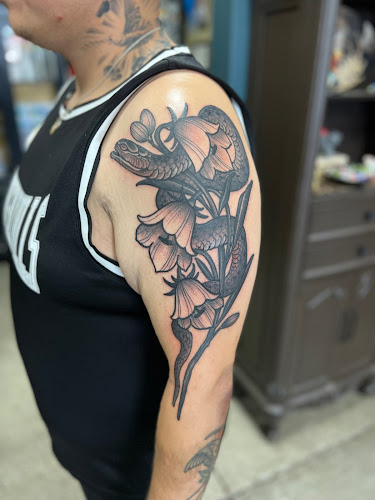 Work by Broken Dagger Tattoo