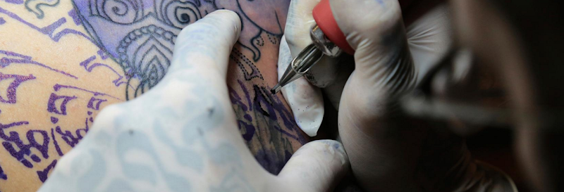 Work by Cleen Rock One's Golden Skull Tattoo