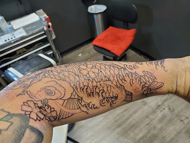 Work by Collective Tattoo Parlor