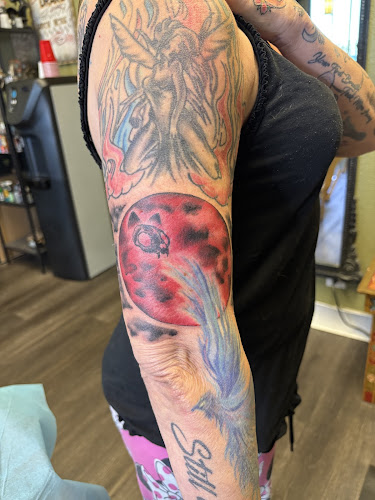 Work by Copper Cobra Tattoo