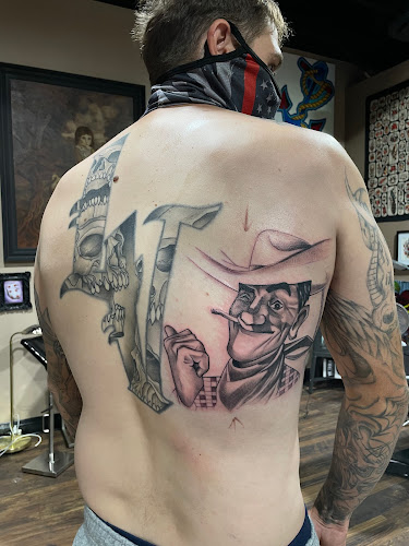 Work by Higher Ground Tattoo