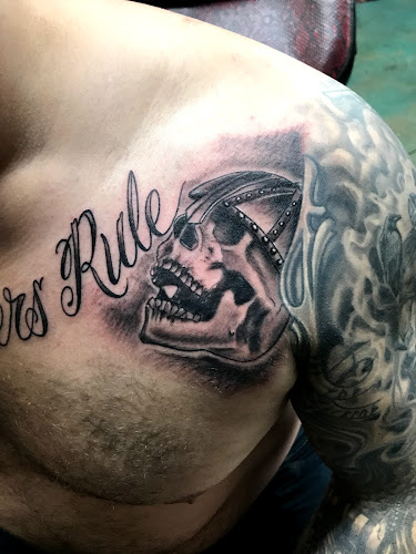 Work by Illuminati Tattoo Co.