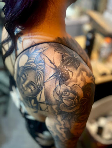 Work by Rebel Ink Tattoo and Piercing