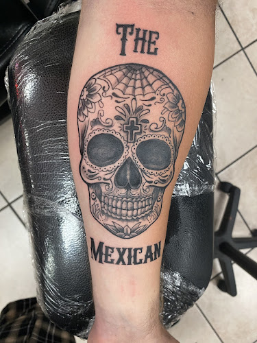 Work by Rockstar Tattoo