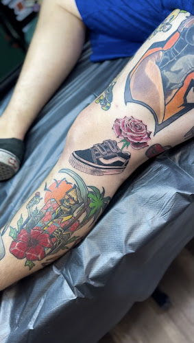 Work by The Emerald Ink Parlor
