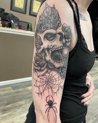 Work by The Tattoo Den, LLC