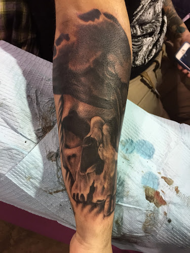 Work by 3 Treasures Tattoo