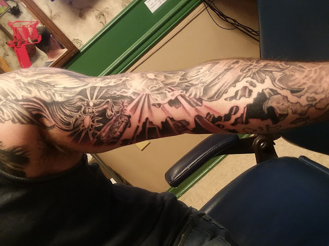 Work by Machine Heads Tattoo Parlor