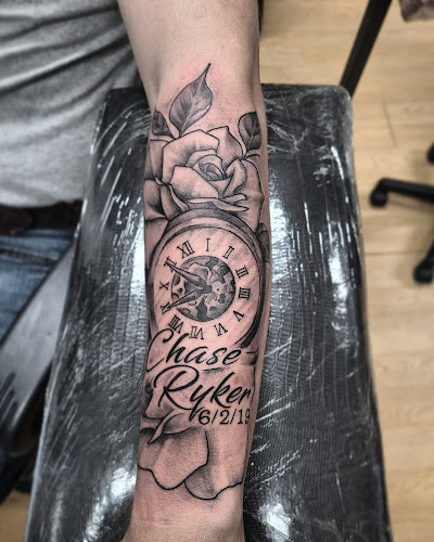 Work by Rose and Dagger Tattoo