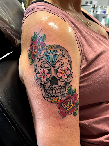 Work by Dark Lotus Tattoo Co.