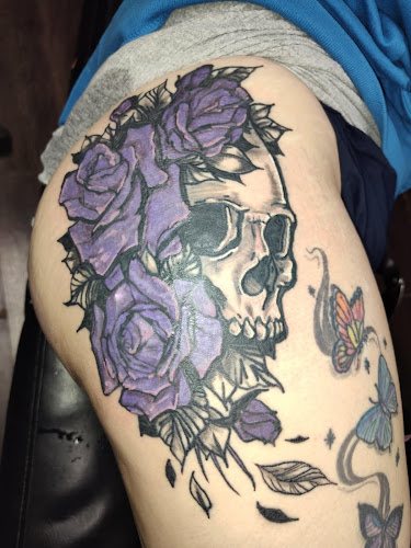 Work by An Evil Angel Social Club Tattoo Parlor