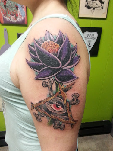 Work by The Silver Shamrock Tattoo Company
