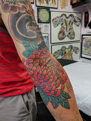 Work by Bob Robert's Spotlight Tattoo