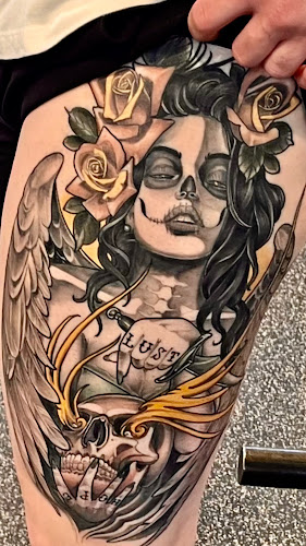 Work by Broken Art Tattoo