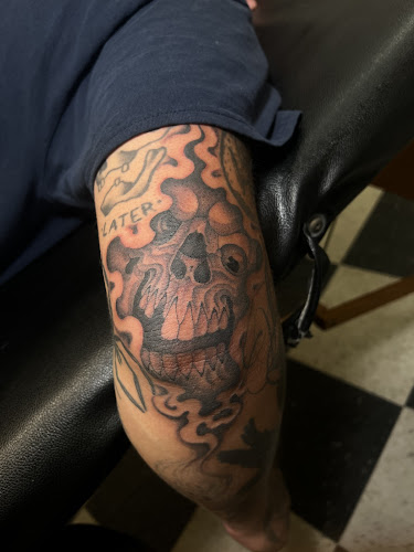 Work by Mid Town Tattoo Shop