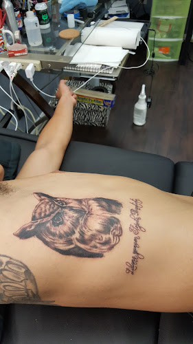 Work by Monkey Face Tattoos