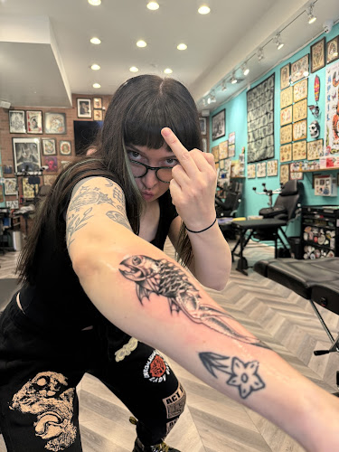 Work by Old Tradition Tattoo