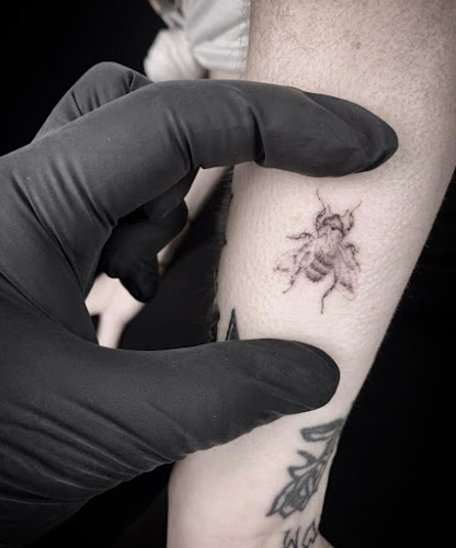 Work by Suerte Tattoo