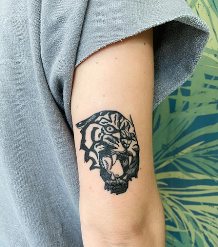 Work by Supersweet Tattoos and Coffee
