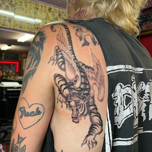 Work by Tattoo Love & Body Piercing Co.