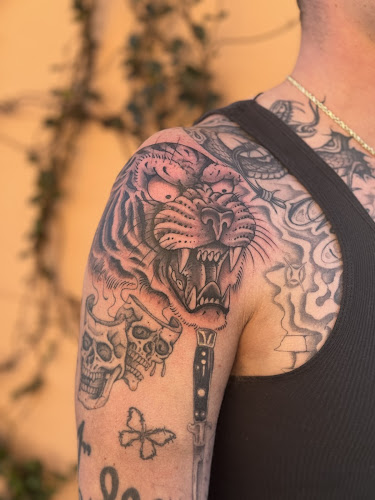 Work by The Estate Tattoo
