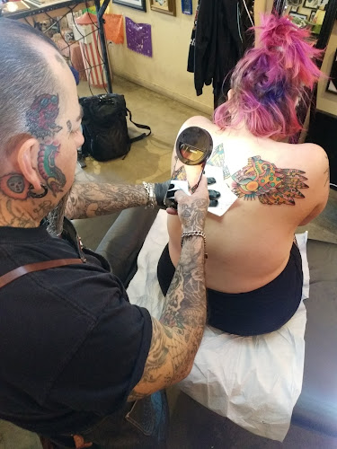 Work by Tinta Rebelde hardcore tattoo