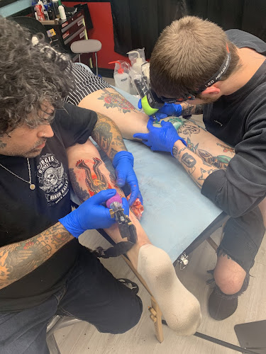 Work by Western Winds Tattoo Shop