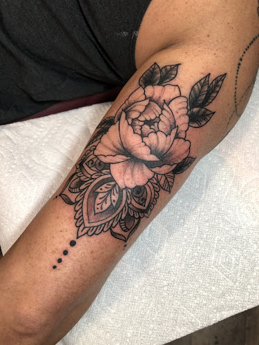 Work by Black River Tattoo Co