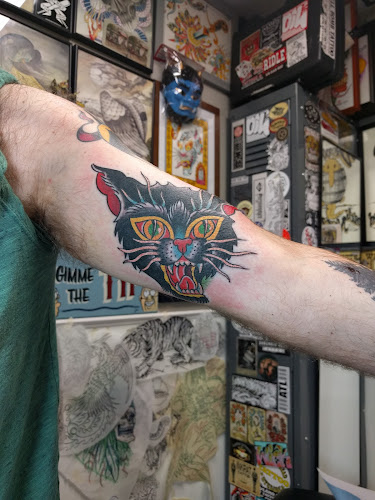 Work by Acme Tattoo Co.