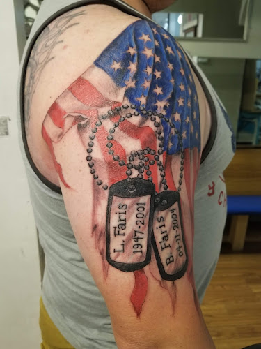 Work by Dollhouse Tattoo and Art Studio