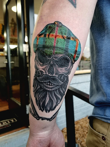 Work by Lady Liberty Tattoo Parlor